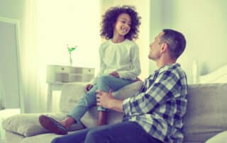 Filing for Child Custody in Los Angeles County California image portrayed by a daughter and her father smiling.